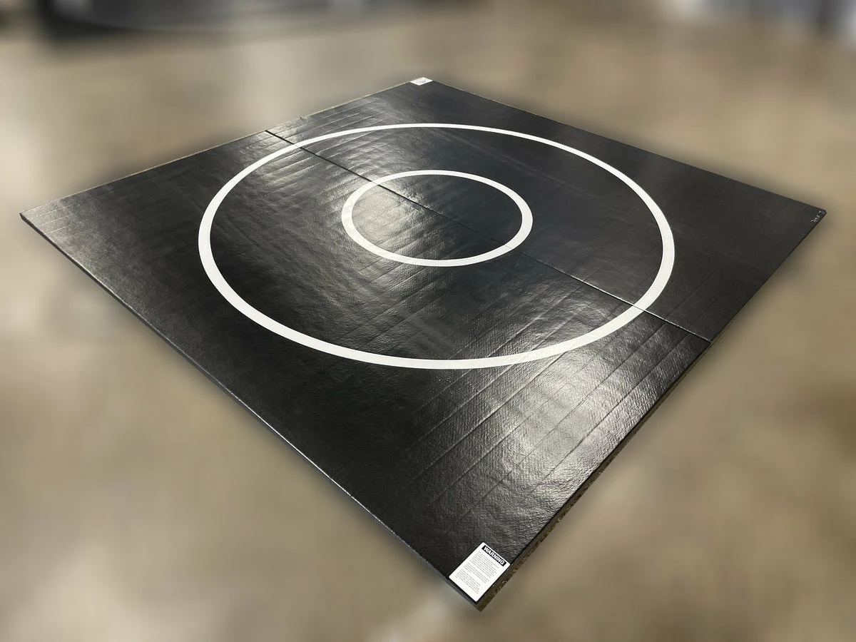 AK Athletic Equipment Clearance 10' X 10' X 1 3/8" Roll-Up Wrestling Mat Black With White Circles And No Starting Lines 1 AK Athletic Equipment Clearance 10' X 10' X 1 3/8" Roll-Up Wrestling Mat Black With White Circles And No Starting Lines