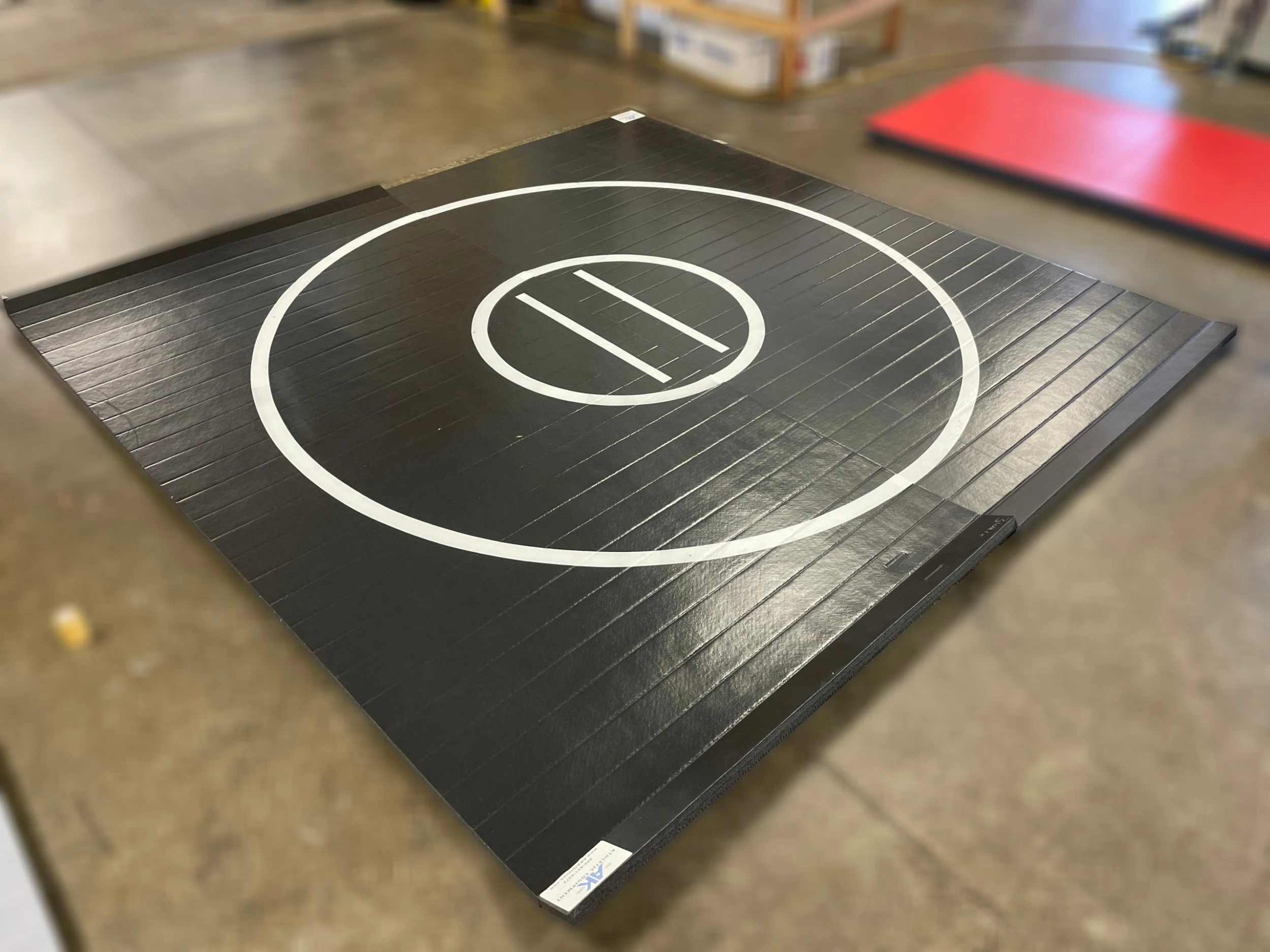 AK Athletic Equipment Clearance 10' X 10' X 1 3/8" Roll-Up Wrestling Mat Black With White Circles - Indentation 1 AK Athletic Equipment Clearance 10' X 10' X 1 3/8" Roll-Up Wrestling Mat Black With White Circles - Indentation