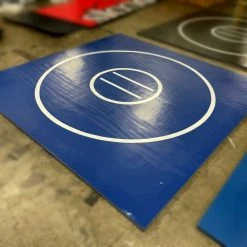 AK Athletic Equipment Clearance 10' X 10' X 1 3/8" Roll-Up Wrestling Mat Blue With White Circles And Lines- Damage On Back