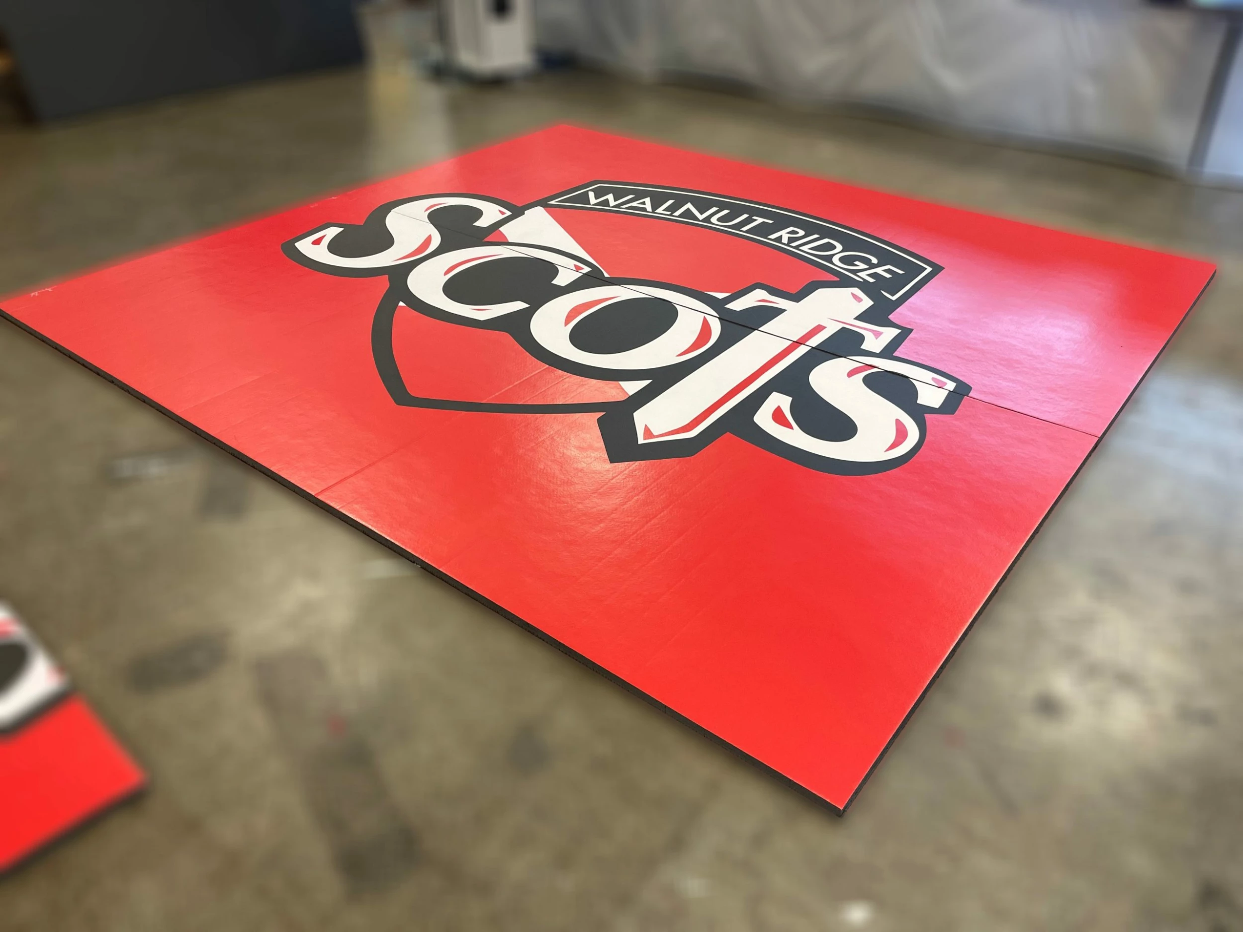 AK Athletic Equipment Clearance Wrestling Mat 12’ 1/2” X 10’ 11” X 1 3/8" Roll-Up Mat Red Mat With Logo 1 AK Athletic Equipment Clearance Wrestling Mat 12’ 1/2” X 10’ 11” X 1 3/8" Roll-Up Mat Red Mat With Logo