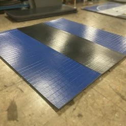 AK Athletic Equipment Clearance Wrestling Mat 12' X 12' X 1 5/8" Ultra Shock Roll-Up Mat Black And Blue With No Circles