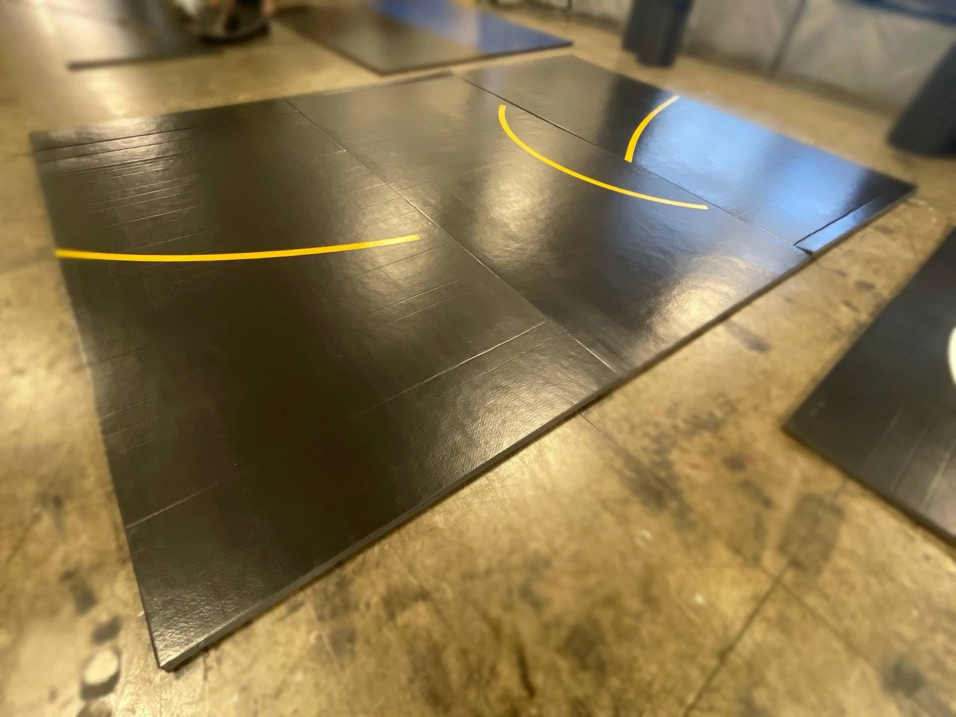 AK Athletic Equipment Clearance Wrestling Mat 13'x18'x1.58" Ultra Shock Roll Up Wrestling Mat- Black With Yellow Circle Segments 1 AK Athletic Equipment Clearance Wrestling Mat 13'x18'x1.58" Ultra Shock Roll Up Wrestling Mat- Black With Yellow Circle Segments
