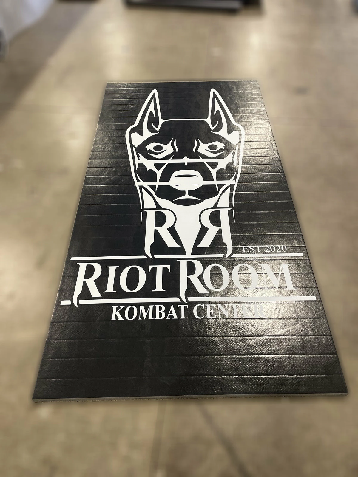 AK Athletic Equipment Clearance 5' X 10' Black Mat With Logo Error Roll-Up Mat Print Flaw 1 AK Athletic Equipment Clearance 5' X 10' Black Mat With Logo Error Roll-Up Mat Print Flaw