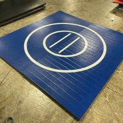 AK Athletic Equipment Clearance 8' X 8' X 1 3/8" Roll-Up Wrestling Mat Blue With White Circles