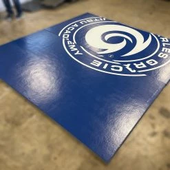 AK Athletic Equipment Clearance Wrestling Mat 9' X 10' X 1 3/8" Roll-Up Mat Vinyl Blue With Logo