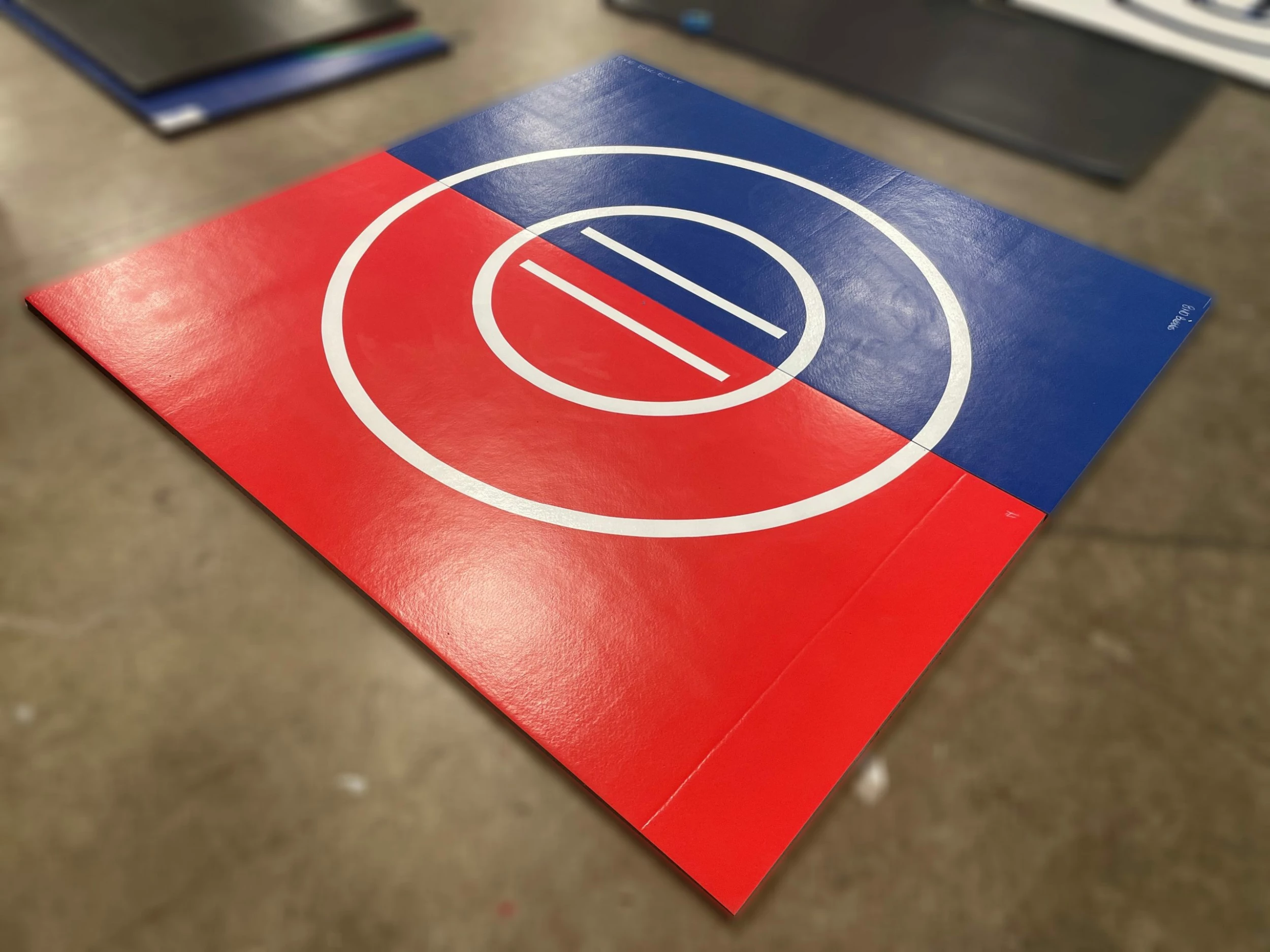 AK Athletic Equipment Clearance 8' X 8' X 1 3/8" Roll-Up Wrestling Mat Blue And Red Vinyl Flaw 1 AK Athletic Equipment Clearance 8' X 8' X 1 3/8" Roll-Up Wrestling Mat Blue And Red Vinyl Flaw