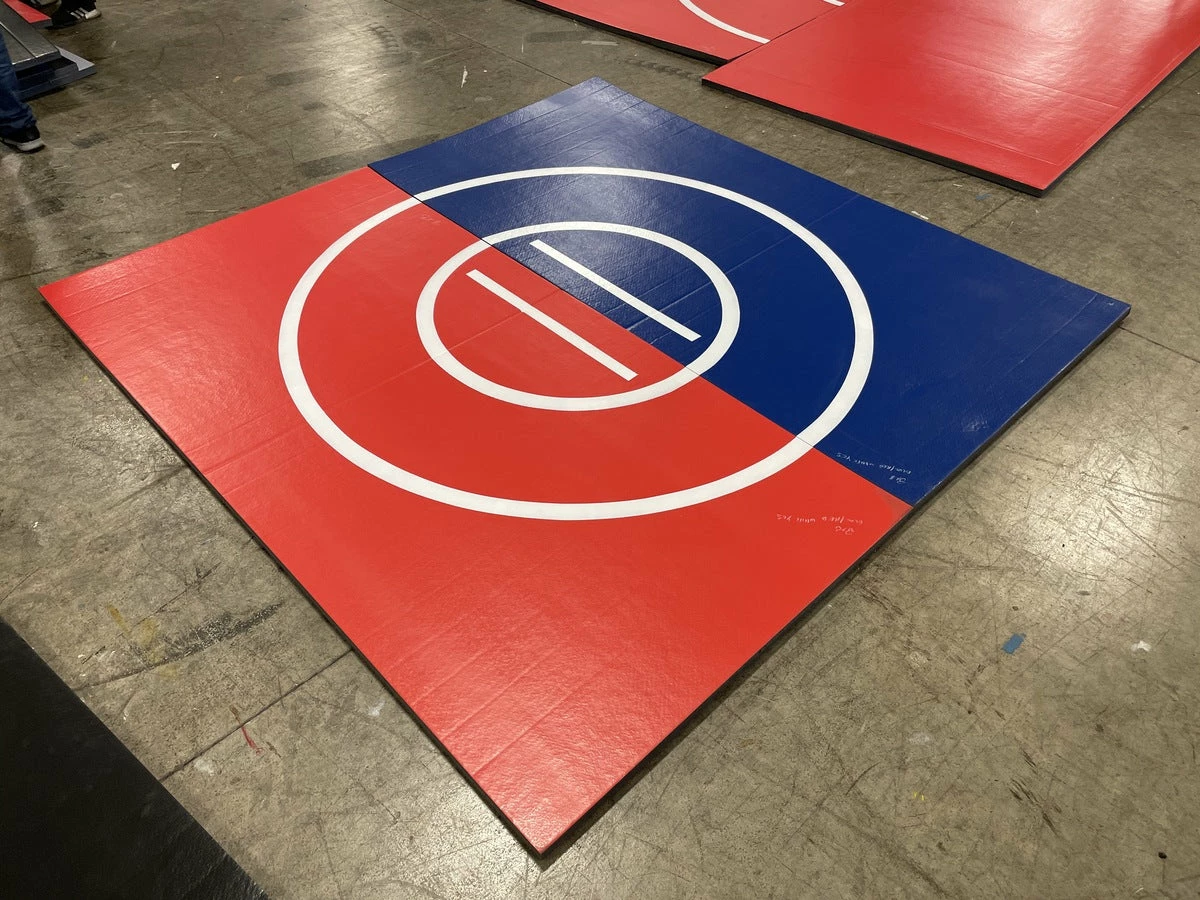 AK Athletic Equipment Clearance 8' X 8' X 1 3/8" Roll-Up Wrestling Mat Red And Blue With White Circles 1 AK Athletic Equipment Clearance 8' X 8' X 1 3/8" Roll-Up Wrestling Mat Red And Blue With White Circles